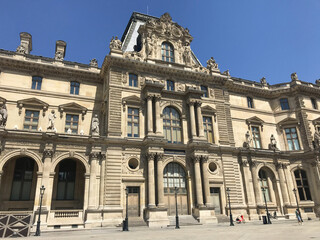Fototapeta na wymiar The Louvre Palace Museum near the pyramid in Paris, France