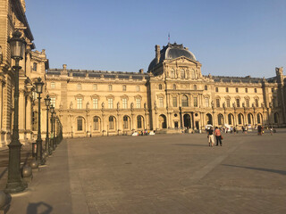 Obraz premium The Louvre Palace Museum near the pyramid in Paris, France