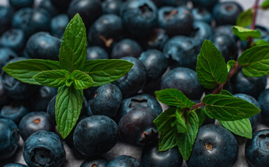 berries of bow whortleberry and leaves of mint