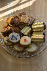 Group of delicious sweet Christmas cookies, white vanilla rolls, gingerbread, linzer and chocolate sweets wiht jam filling