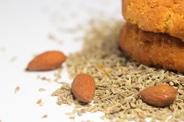 almonds (without shell) and sesame, homemade cookies, white background