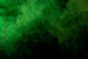 Green smoke on black background