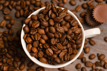 Coffee grains in a porcelain cup