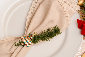 Plates and utensils on Christmas table