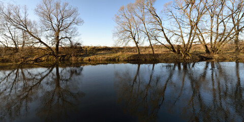 Autumn fishing on the river, beautiful panorama.