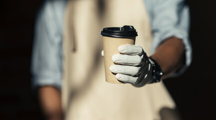 Delicious takeaway coffee in favorite cafe during social distancing