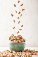 Bowls with oat or wheat bran.   Diet or vegan food. Levitation
