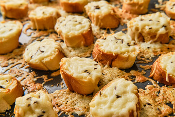 Prepared oven baked appetizers with cheese