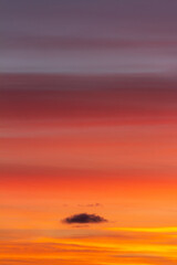 Wonderful autumn evening sky of various pleasant colors (blue, purple, pink, orange, yellow) at sunset