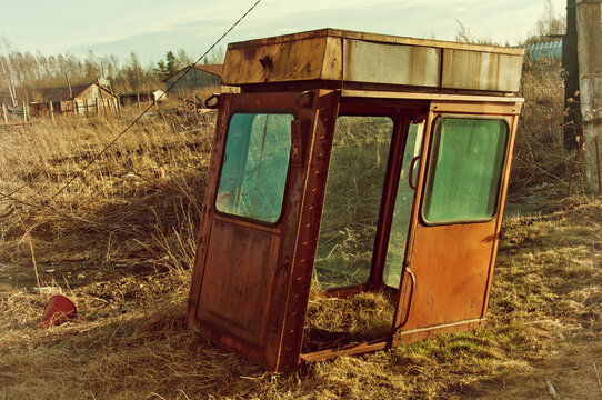 View of an old abandoned trailer in the countryside. An image of decrepitude or natural disaster.