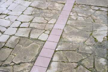 texture of the old stone road for the designer, rough gray background, concept of ancient European architecture, tourism, travel