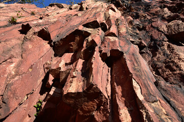 Fototapeta premium Red volcanic rock rhyolite - Swierzawa, Kaczawskie Mountains, Lower Silesia Poland