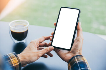 cell phone blank white screen mockup.woman hand holding texting using mobile on desk at office.background empty space for advertise.work people contact marketing business,technology