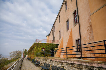 Medieval castle Melnik in sunny autumn day, terrace with observation deck, view of the confluence of the Vltava and Elbe rivers and vineyards, Central Bohemia, Czech republic
