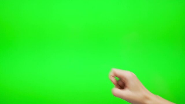 Woman's Finger Touches Slides Flips Images on the Internet on a Green Background, Green Screen, Chromakey, Alpha Channel Touch Digital Device, Laptop, Touch Screen, Close-up, Isolated.