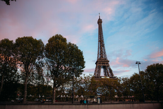 PARIS, FRANCE - October 21, 2017: Eiffel towel view from bridge. Autumn Sunset in Paris