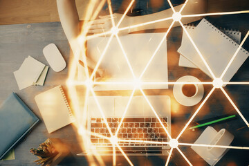 Social network theme hologram over woman's hands writing background. Concept of international people connect. Double exposure