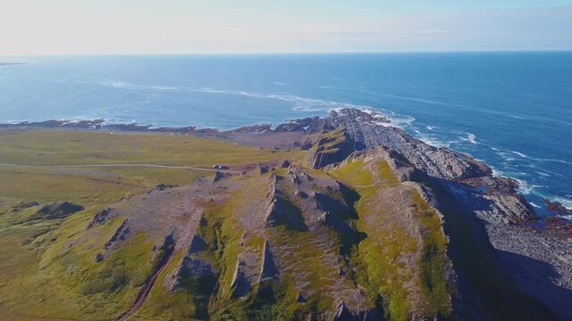 Aerial view of the landscape of the Rybachy Peninsula, Russia. The tectonic plates of the Cape Kekurski.