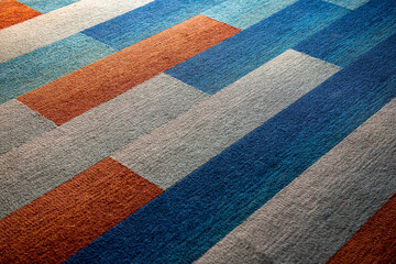 Colorful carpet floor texture background. Interior luxury design in an office, living room and hotel. Selective focus.