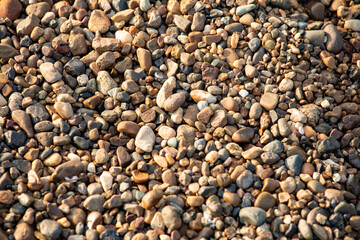 background of stone pebbles on the seashore