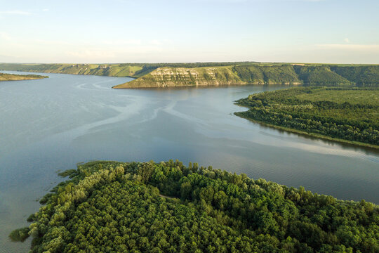 Wide Dnister river and distant rocky hills in Bakota area, part of the National park "Podilski Tovtry" in Ukraine