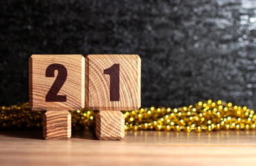 The inscription on the wooden blocks is 2021. New year's design.