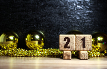 The inscription on the wooden blocks is 2021. New year's design.