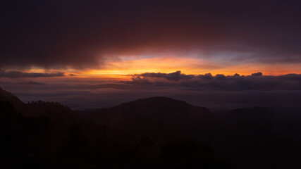 Landscape mountain silhouette at sunrise