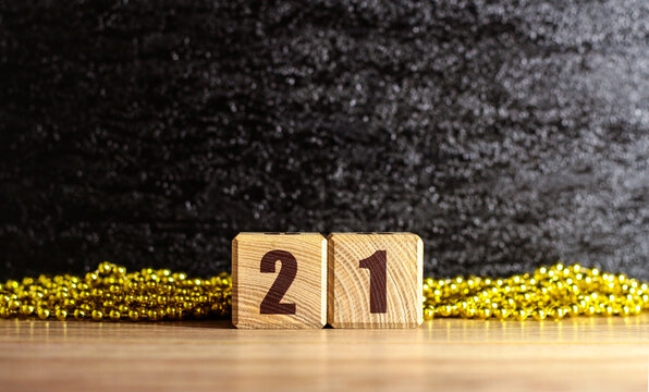 The inscription on the wooden blocks is 21. New year's design.