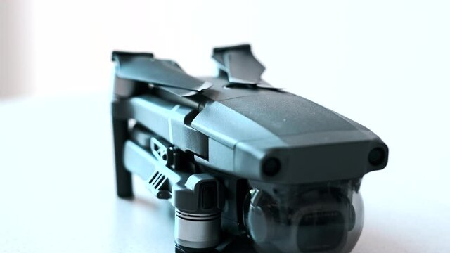 details of a folded drone with slider movement
