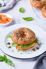 Plating, fast lunch, meal. Bagels with cream cheese and salmon