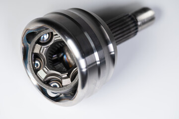 New automotive CV joints on a gray background. New background parts for articles