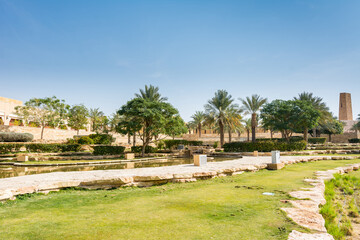 Date trees and ruins of Diraiyah clay castle, also as Dereyeh and Dariyya, a town in Riyadh, Saudi Arabia, was the original home of the Saudi royal family, and the capital of the Emirate of Diriyah.