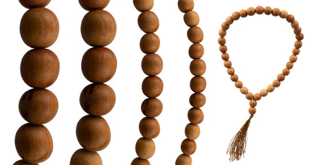 Old wooden prayer beads with a large view of beads in various angles on a white background