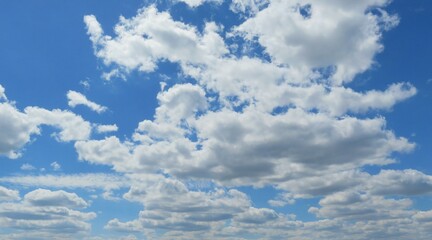 Blue sky with fluffy clouds