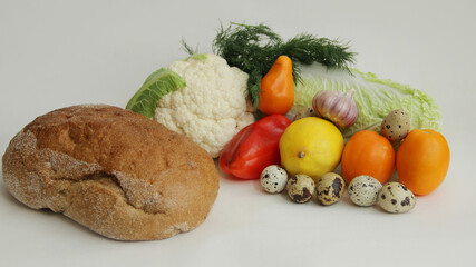 fresh vegetables, cabbage, cauliflower, sweet pepper, quail eggs, garlic, tomatoes, walnuts and bread