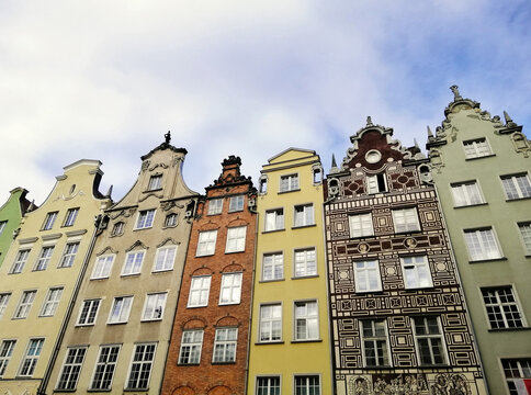 Low angle shot of colorful tenament houses facades in old city of Gdansk, Poland