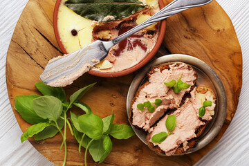 Toast with pate terrine in plate,  knife