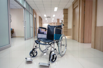 Empty wheelchair on corridor in the hospital