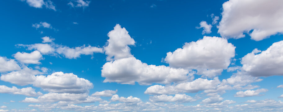 Blue Sky with Puffy White Clouds Background-2 © Robert Appleby