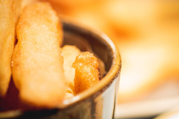 A bowl of triple cooked chips.