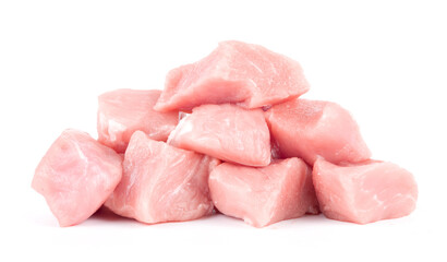Pile of pork uncookes chopped cubes close up isolated on white background