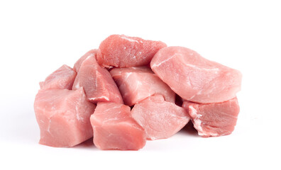Pile of pork uncookes chopped cubes close up isolated on white background