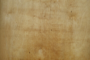 Softwood plywood fibers as background.