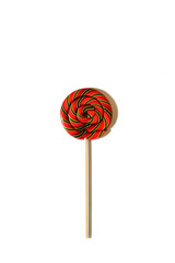 Round red lollipop on white isolated background. Top view, close-up. Poster, postcard.
