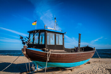 Fototapeta na wymiar Traditional fishing boat and equipment at the coast of the Baltic Sea, Germany
