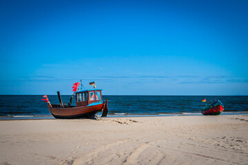 Naklejka na ściany i meble Traditional fishing boat and equipment at the coast of the Baltic Sea, Germany