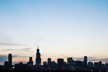 Fototapeta na wymiar Beautiful Chicago skyline at sunrise, backlit