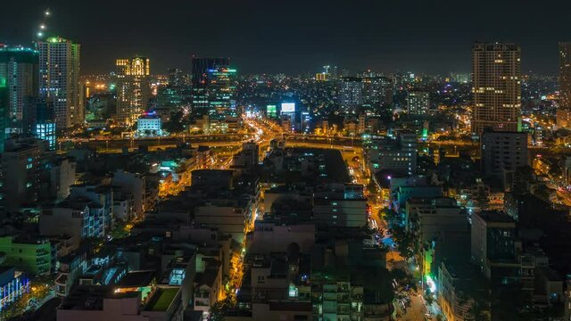 Dolly right time lapse sequence showing skyline of Ho Chi Minh City aka Saigon in southern Vietnam. Ho Chi Minh City is the most populous and largest city in the country.	