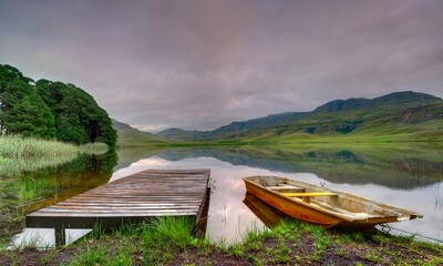 ROW BOATS and wooden jetty, Giant's Cup Wilderness Reserve, Underberg,kwazulu Natal, South Africa